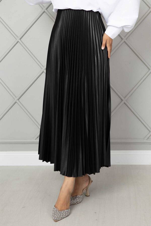 CVN - Beli Lastikli Piliseli Tesettür Etek Siyah (1) CVN - Beli Lastikli Piliseli Tesettür Etek Siyah (1)